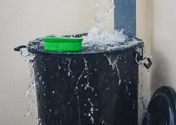 attention au débordement du récupérateur d'eau